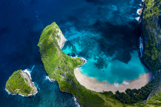 Aerial drone landscape of the famous beach of Kelingking and located on the island of Nusa Penida in Bali Indonesia.
